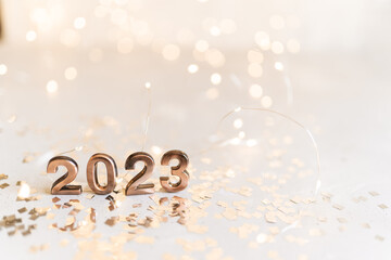 happy new year 2022 background new year holidays card with bright lights,gifts and bottle of...