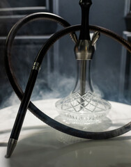 Smoke luxury hookah in lounge bar.  
