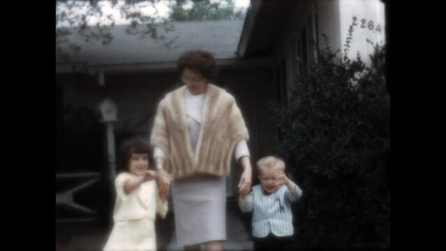 Leaving for Church 1967 - Women and children ready for Easter mass leave their house in Canoga Park, California in 1967. 