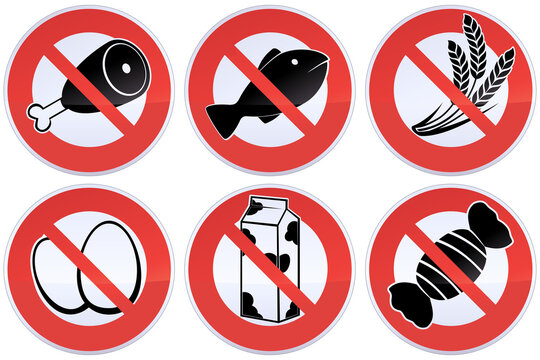 Collection Of Circular Red And White Prohibition Signs With The Crossed Out Symbol Of A Food Prohibition Such As Meat, Fish, Cereals, Eggs, Milk Or Sweets (metal Reflection)