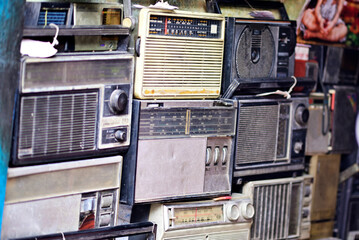 Many old transistor radio in a repairing shop