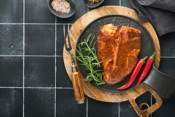 Raw steak t-bone or porterhouse. Steak t-bone or porterhouse in sauce with spices, salt and...