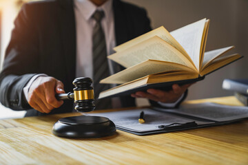 Attorneys or lawyers who are reading the statute of limitations Consultation between male lawyers and business clients, tax and legal and legal services firms.