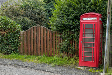 Fototapeta premium old red telephone box