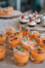 Wedding buffet in heart of glass on the beach of Tarragona in Spain.