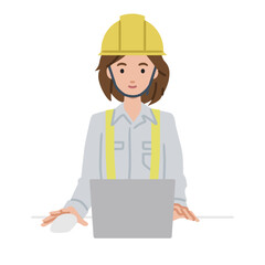 デスクで座ってPCを使っている工事現場の女性
