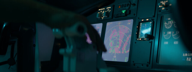 CU on airplane weather radar screen inside the cockpit, aircraft going through thunderstorm rain...