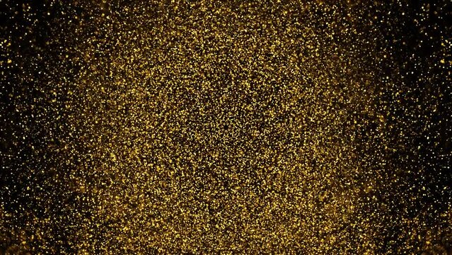 Gold dust particles fly in slow motion in the air lingering slowly. Dust Particles Background Bokeh Lights Background on Black Background 4k Footage Snow Particles Background.