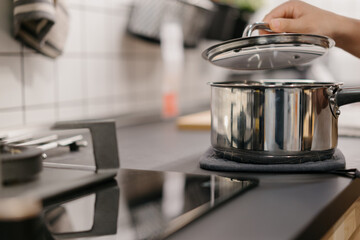 Asian woman is cooking in the kitchen