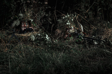 Eastern special forces soldier with rifle in woodland