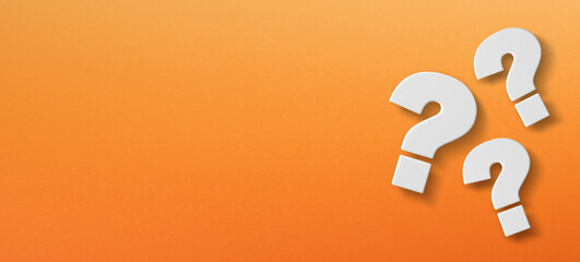 Question mark with copy space on a orange background