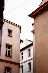 Fototapeta na wymiar Urban alley scene with tall concrete buildings