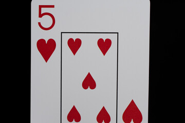Playing cards on a black background