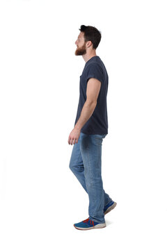 Side View Of A Man Walking On White Backgound