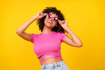 Photo of cool brunette lady wear glasses pink t-shirt isolated on vibrant orange color background