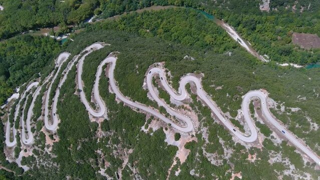 Vikos Gorge road near Voidomatis River, drone,2022
Drone view of road with many zigzag in the Epirus from Greece, 2022
