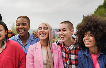 Group of multiethnic girls having fun in the city - Diversity and friendship concept