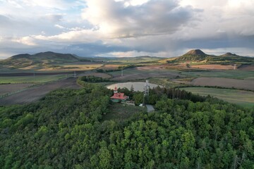 Ceske Stredohori aerial panorama landscape view from lookout tower Stribrnik, Rozhledna Stříbrník (Frotzelova rozhledna), scenic nature view of beautiful mountain range