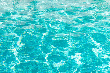 Fototapeta na wymiar blue color background of swimming pool water with ripples in miami