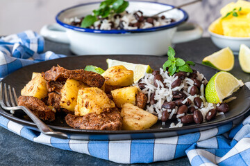 Jerk pork and pineapple with black bean rice