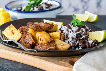 Jerk pork and pineapple with black bean rice