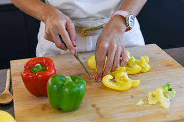 woman cutting vegetables