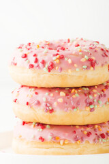 Pink donuts on a white background