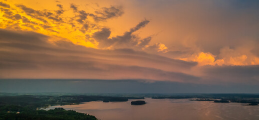 Fototapeta na wymiar Shelf storm clouds with intense tropic rain, aerial panorama of a storm