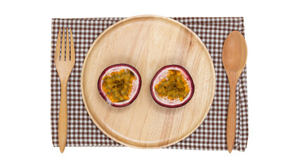 Passion fruit on wooden plate