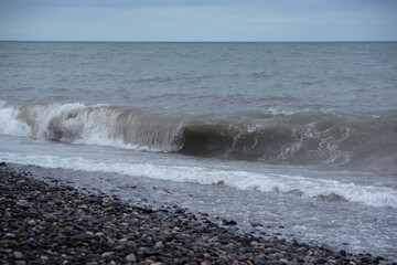 Stormy sea waves breaking near the coast