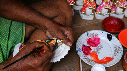 The artist is busy making Lakhsmi idol.