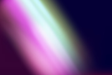 Rainbow highlights on a black background.Glare or reflection from water and glass.Glittering particles for social media backgrounds, product presentations, photo shots.