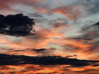 Naklejka na ściany i meble dramatic sunset in the clouds