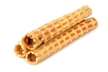 Wafer rolls with condensed milk isolated on white background