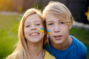 A child with the flag of Ukraine. Evacuation of civilians. Freedom to Ukraine