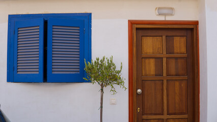 Picture of door and window with wooden shutter At Kos Greece