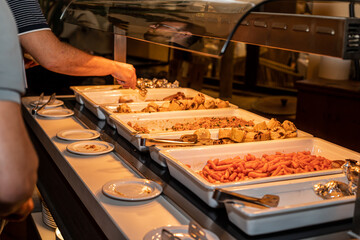 Hotel buffet, baby carrots, corn on the cob and cantonese rice