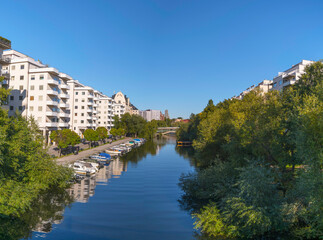 Fototapeta na wymiar Apartment houses at the canal Karlbergskanalen a sunny autumn day in Stockholm