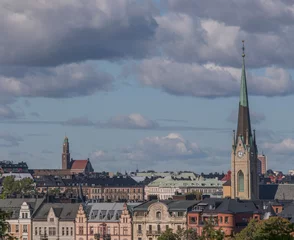 Deurstickers Roofs, dorms, tin facades of churches and apartment buildings in the districts Östermalm and Vasastan a sunny autumn day in Stockholm © Hans Baath