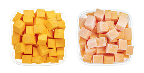 Raw and frozen chopped pumpkin in plastic container. Top view of frozen vegetables isolated on white background. Storage for winter storage in trays