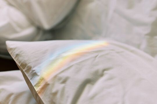 Pillows in closeup with rainbow light
