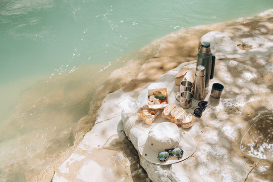 Picnic food and drinks near water