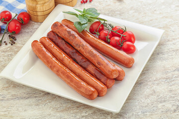 Roasted sausages in the plate