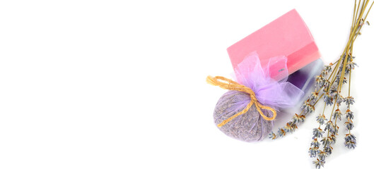 Handmade soap and dry lavender flowers isolated on white. Wide photo. Free space for text.
