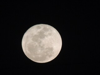 full moon over black