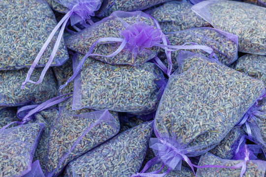 Some sachets with dried lavender flowers as room scent at a sales stand