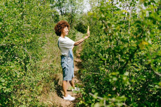 Woman takes a selfie outdoors