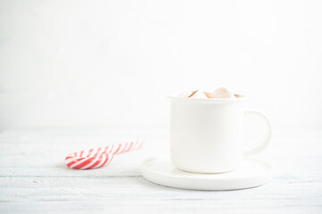 Cocoa marshmallows in traditional New Year's chocolate with caramel.