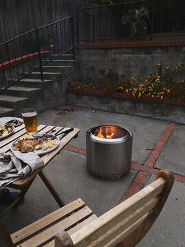 Firepit With Outdoor Table And Chair