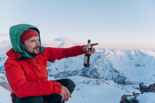 Male explorer pointing away during trip in highlands